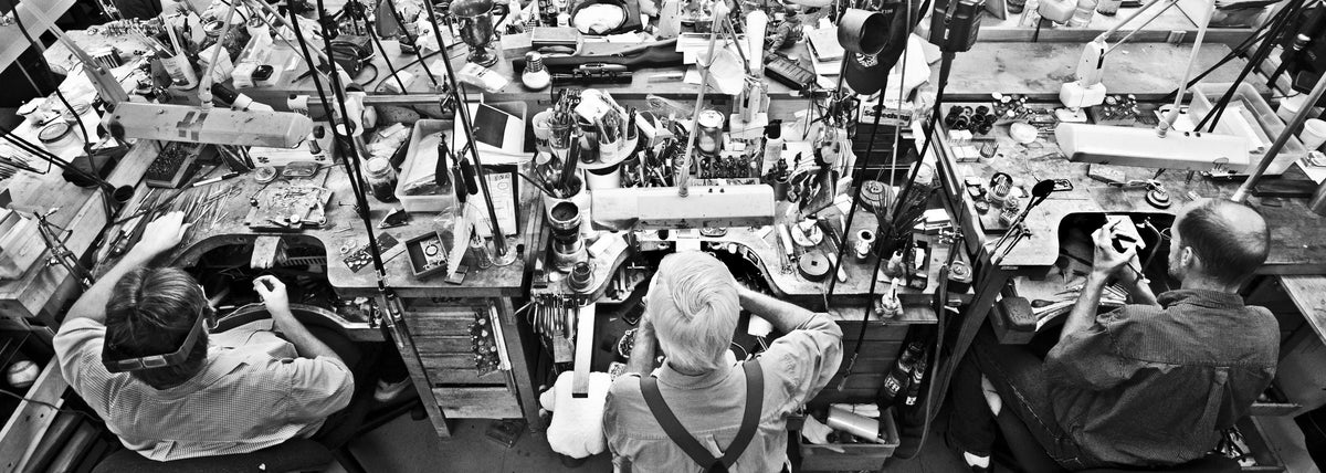 Greenleaf & Crosby jewelers at work at their benches